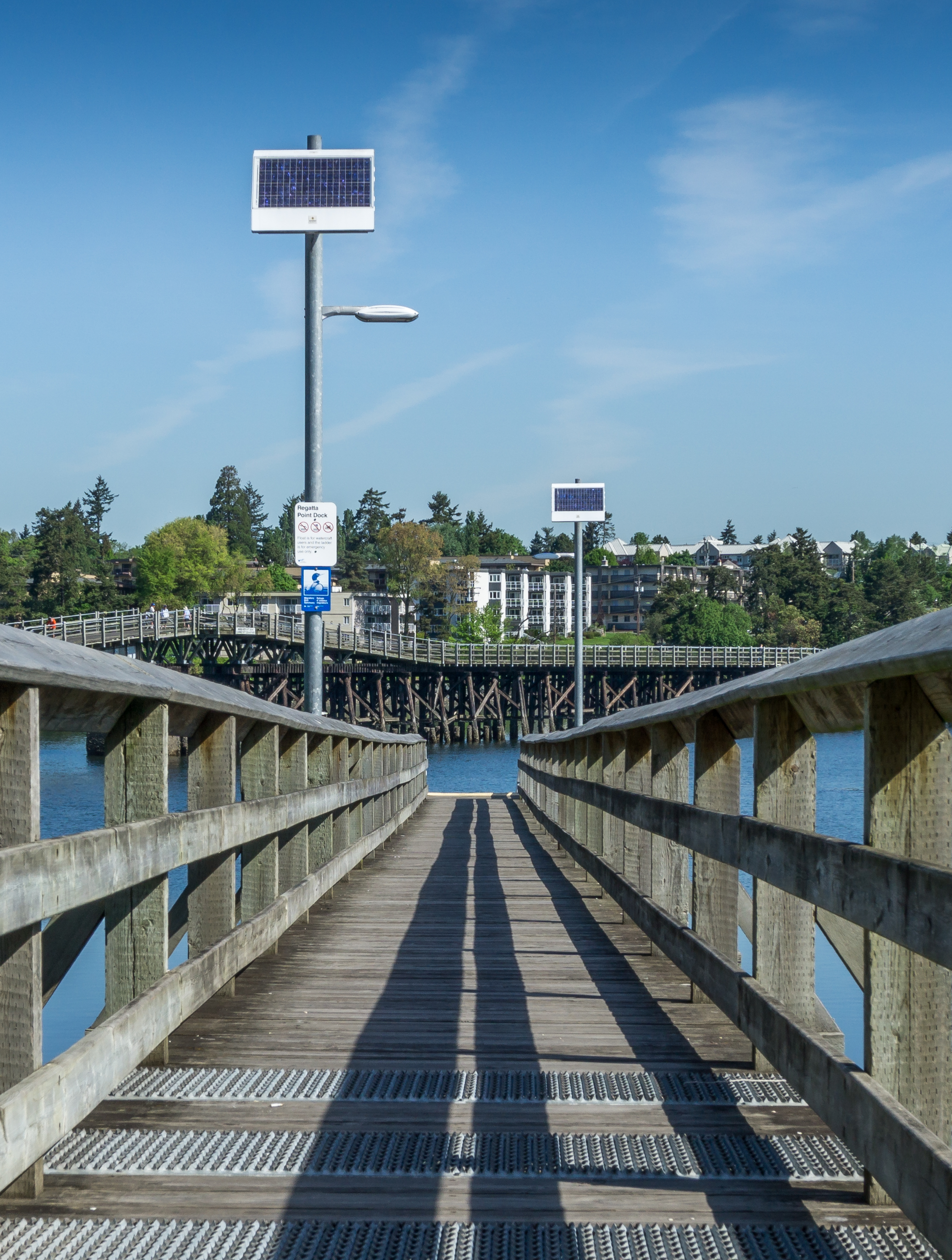 A pier with street lamps running on solar energy, Victoria, British Columbia, Canada 02