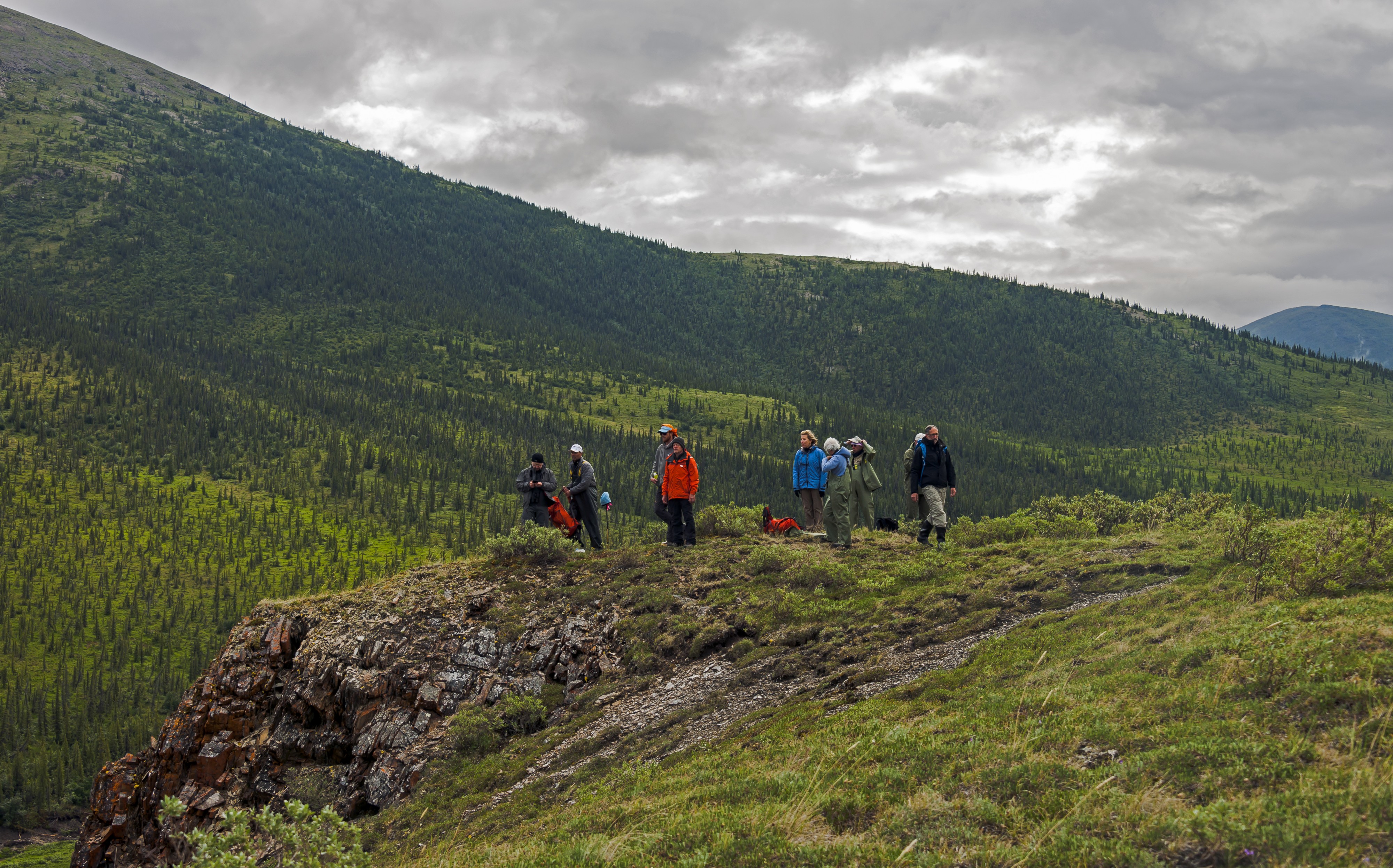 Hikers overlooking confluence of Firth River and Joe Creek, Ivvavik National Park, YT