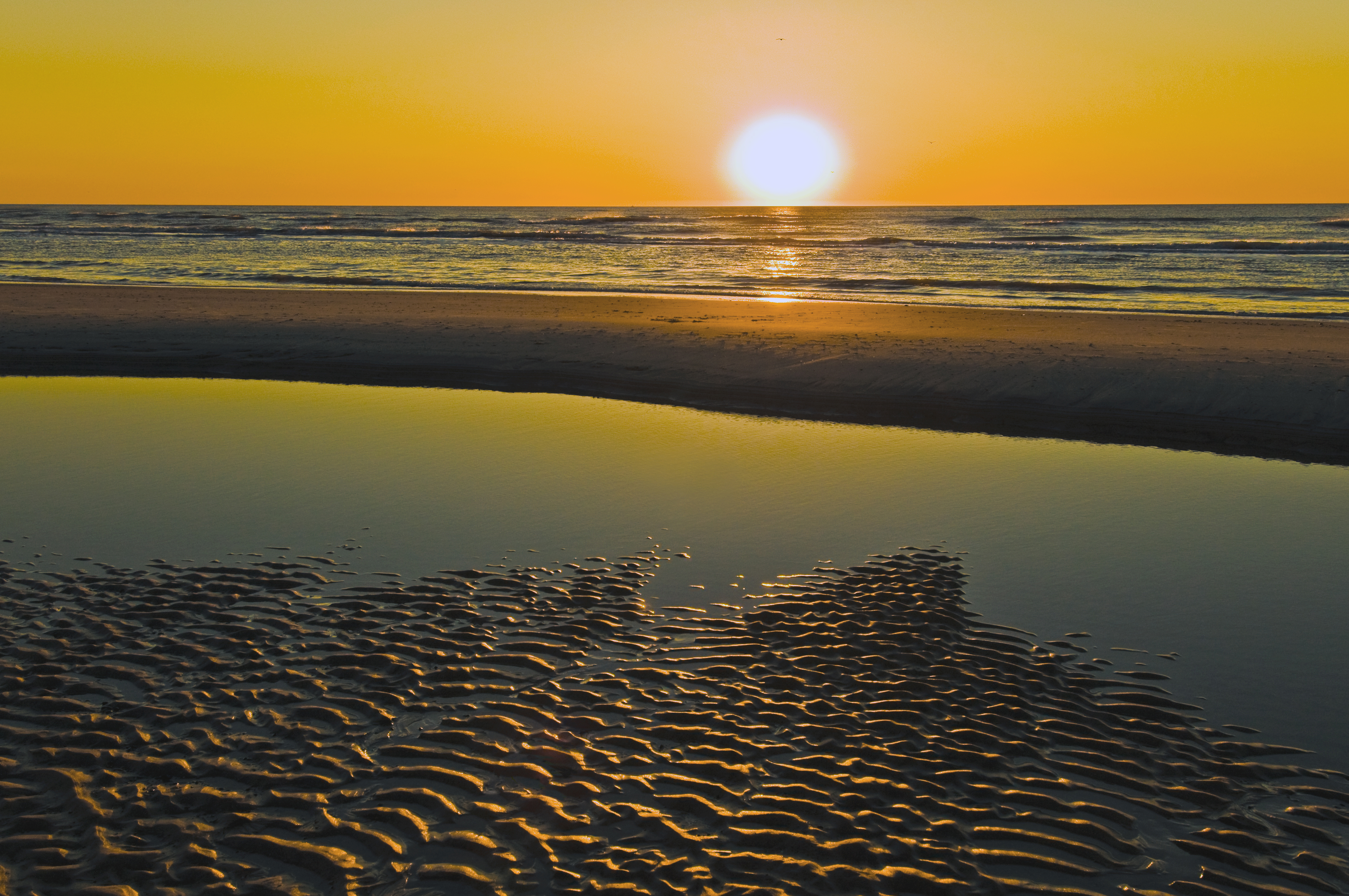 Beach near Årgab during sunset