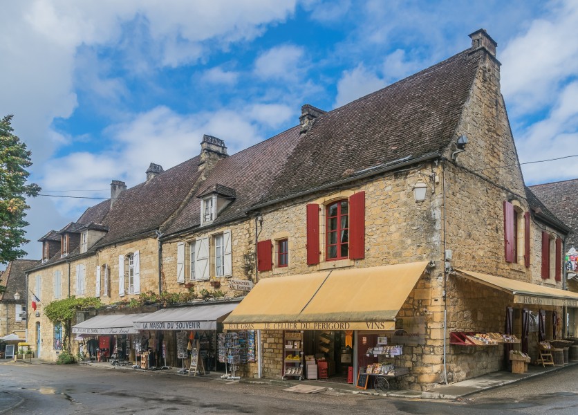 Northern frontage at Place de la Halle in Domme