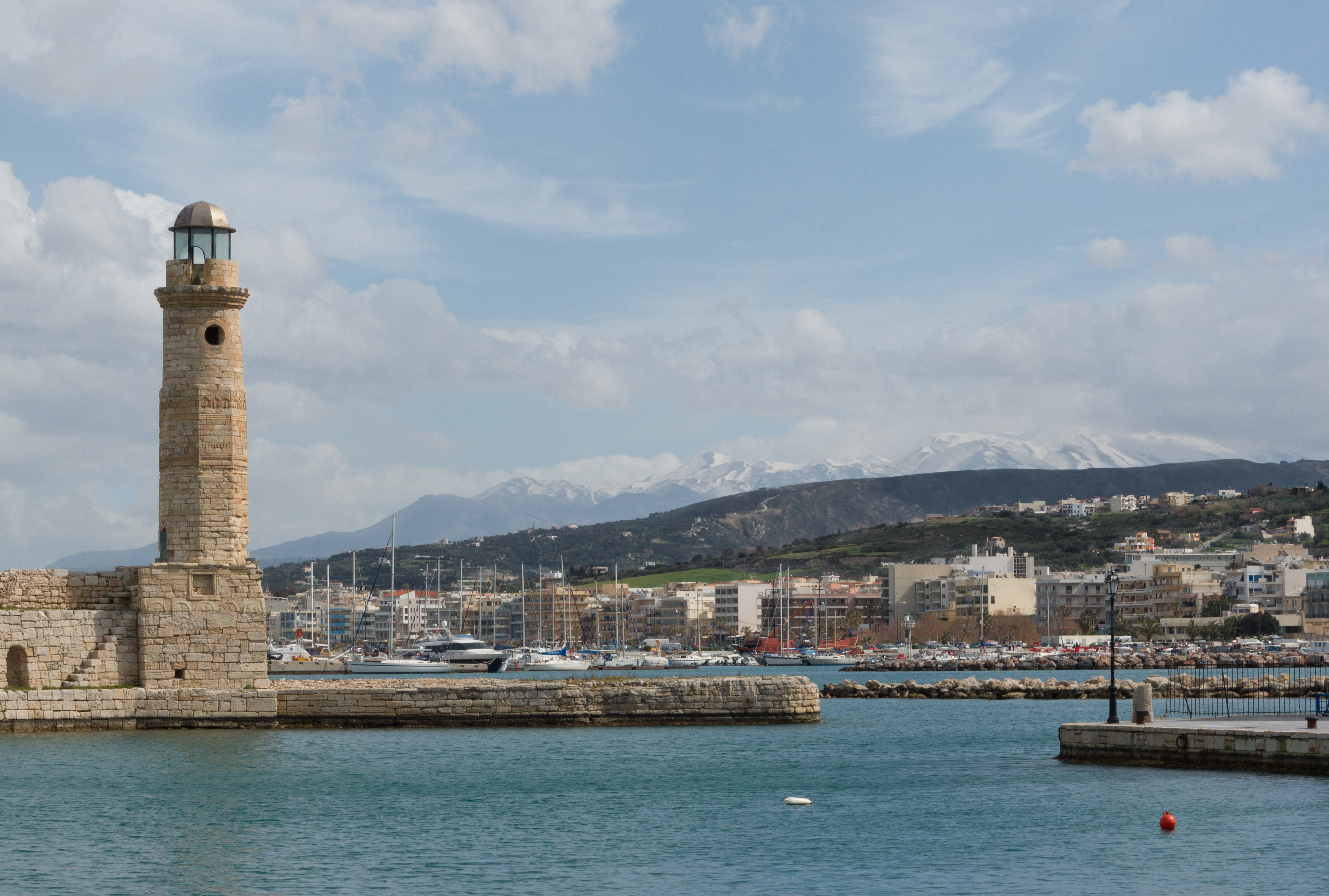 Harbour snowy mountains Rethymno Crete Greece