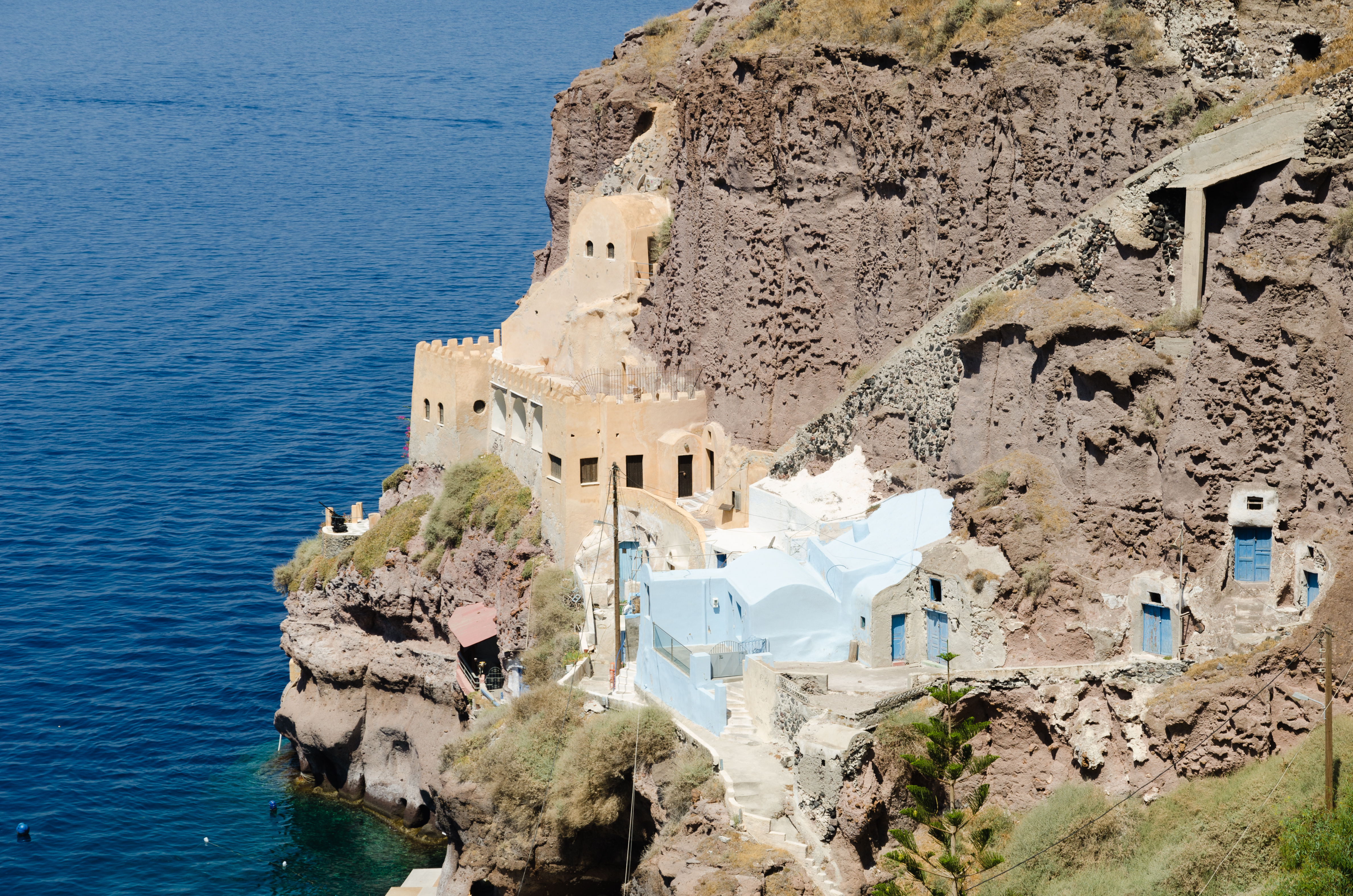 Traditional cave houses at Mesa Gialos - old harbour of Fira - Santorini - Greece - 01
