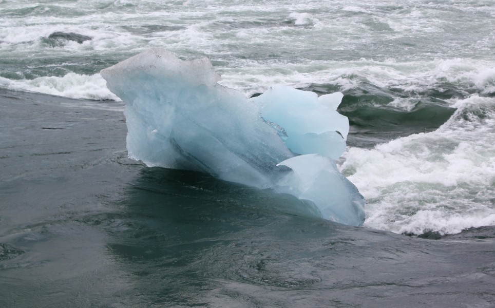 Iceberg in the river draining Jökulsárlón