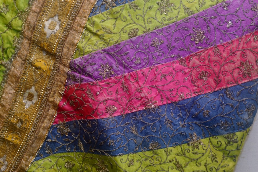 Colored coth with embroidery, detail, Crafts Museum, Delhi