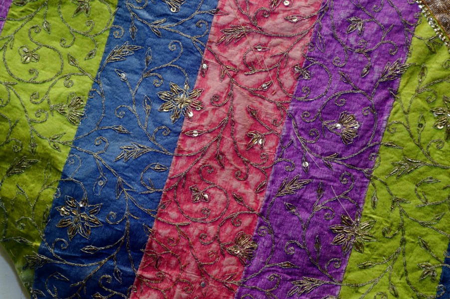 Coulored coth with embroidery, detail, Crafts Museum, Delhi