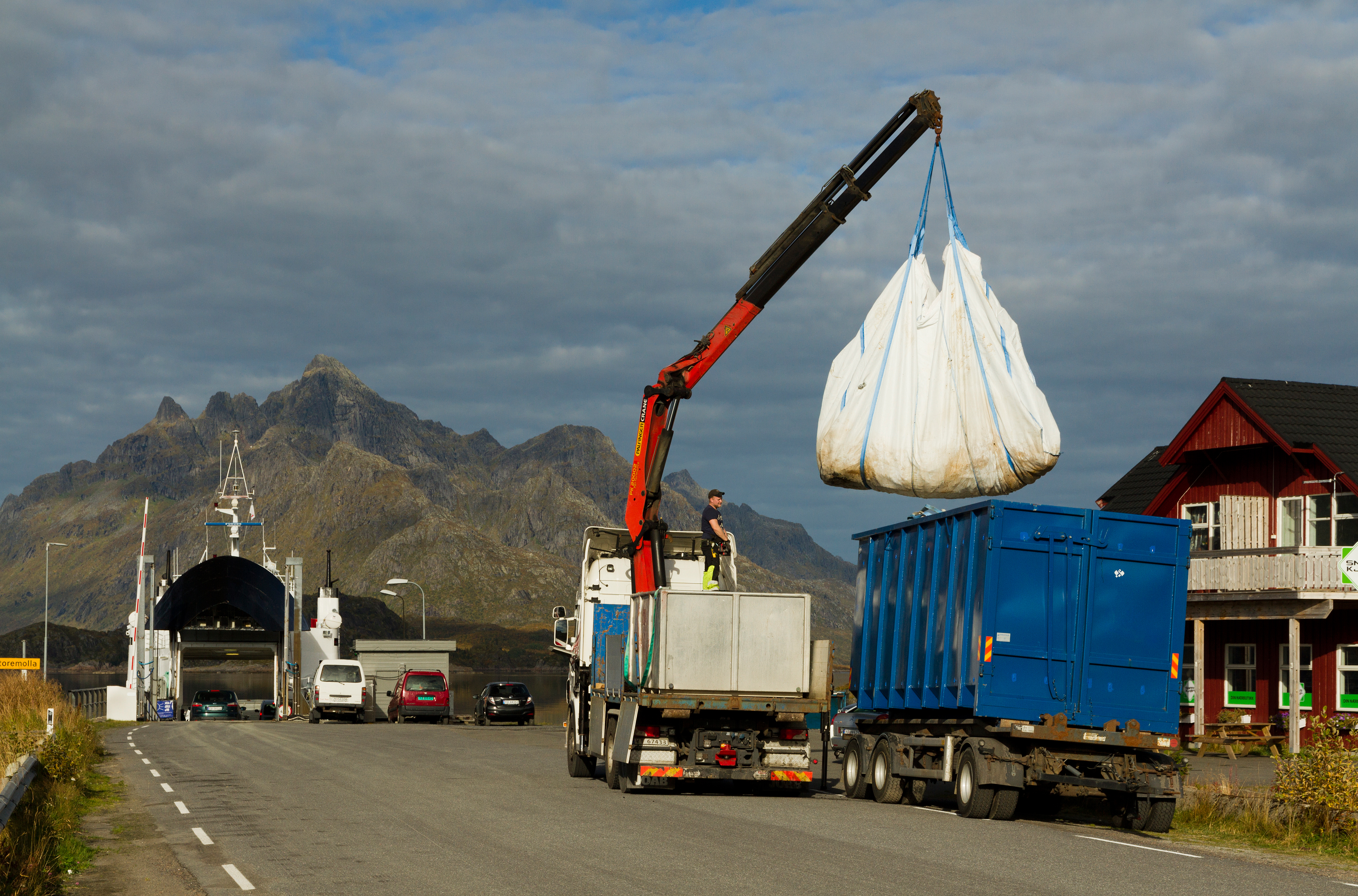 Loading fish cargo in Digermulen port, Hinnøya, Norway, 2015 September