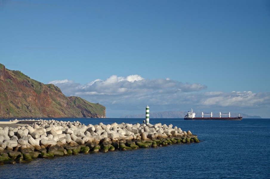 Mole in Funchal, Ponta do Garajau, statue of Cristo Rei and Desertas Islands. Madeira, Portugal