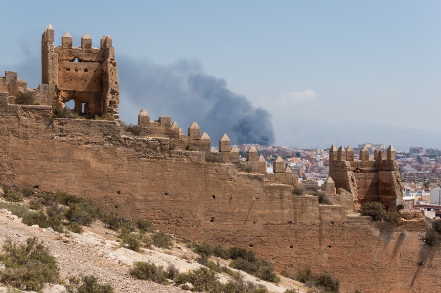 Fortification, fire in background, Almeria, Spain