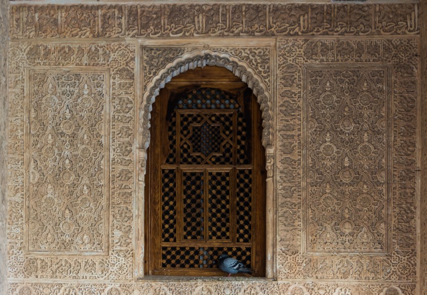 Stuccos, window and pigeon Cuarto dorado Alhambra, Granada, Andalusia, Spain