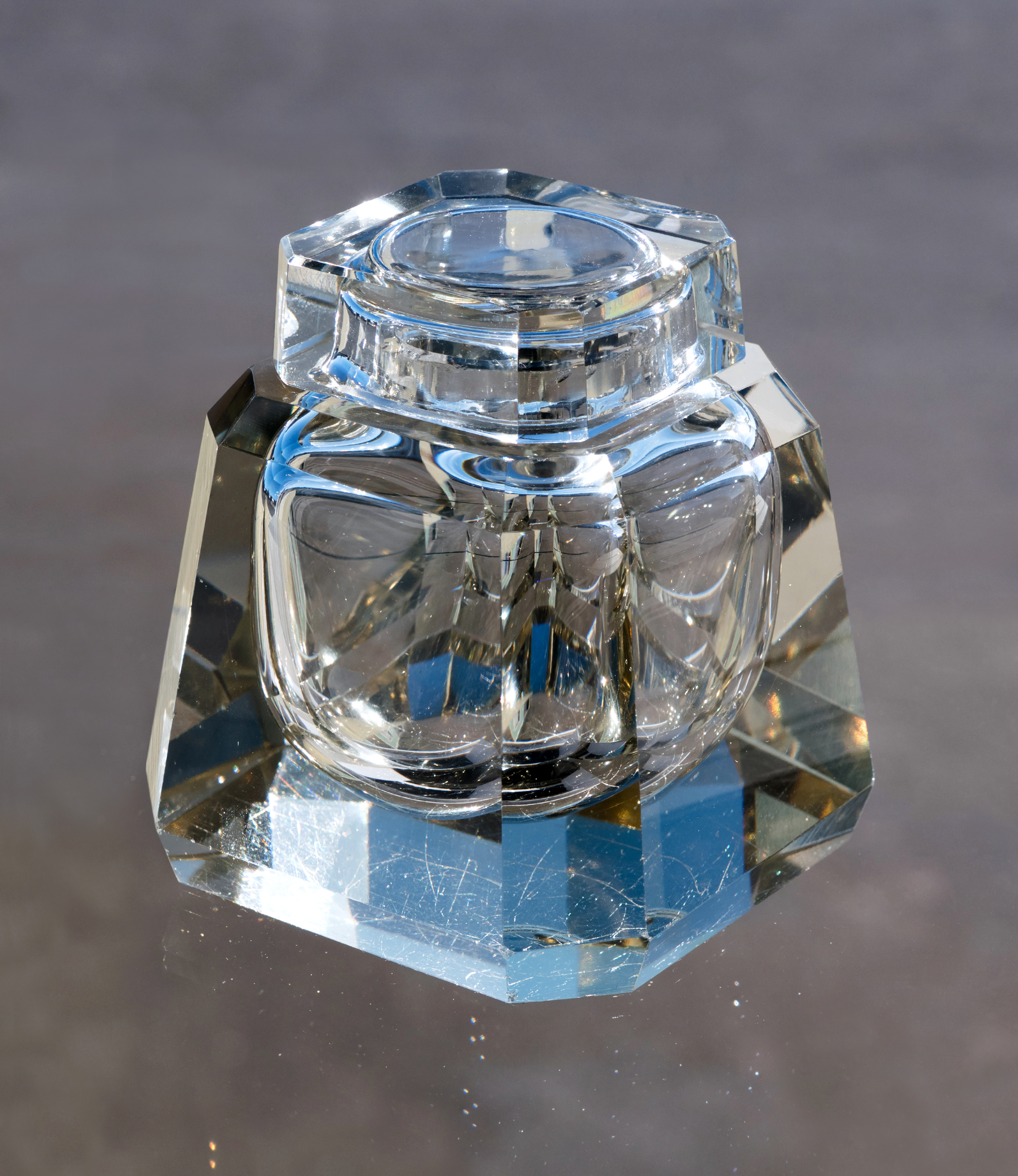 Old scratched glass inkwell