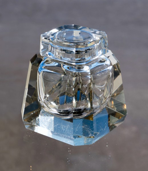 Old scratched glass inkwell