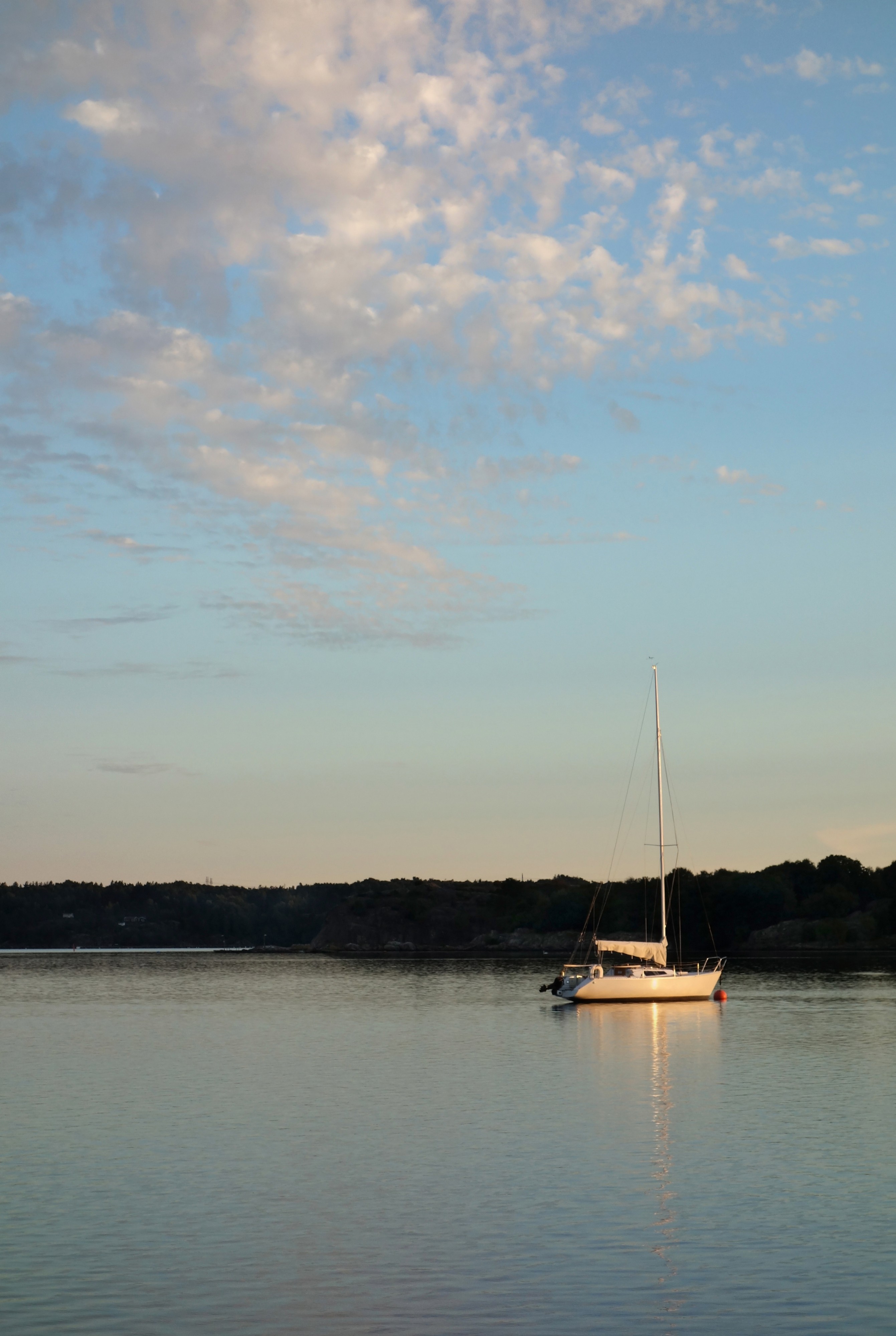 Sailboat at sunset in Brofjorden