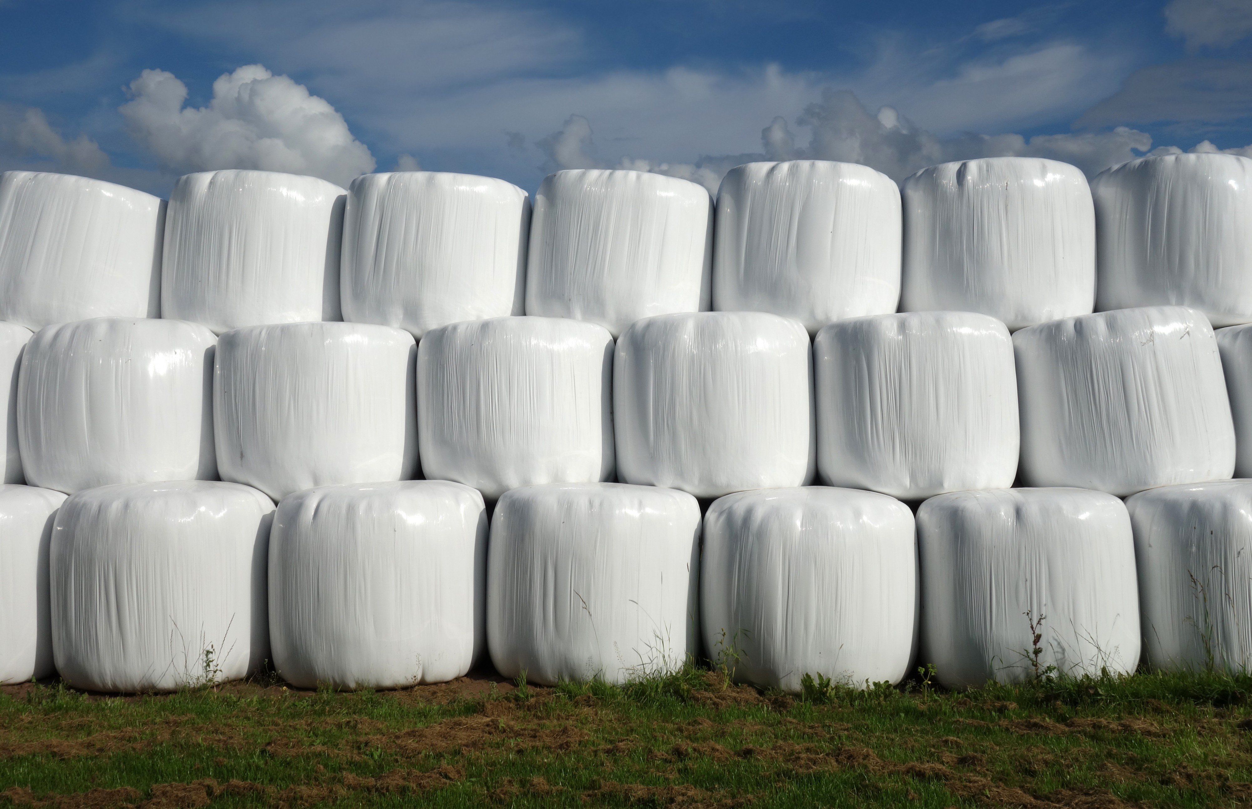Three tiers of silage bales