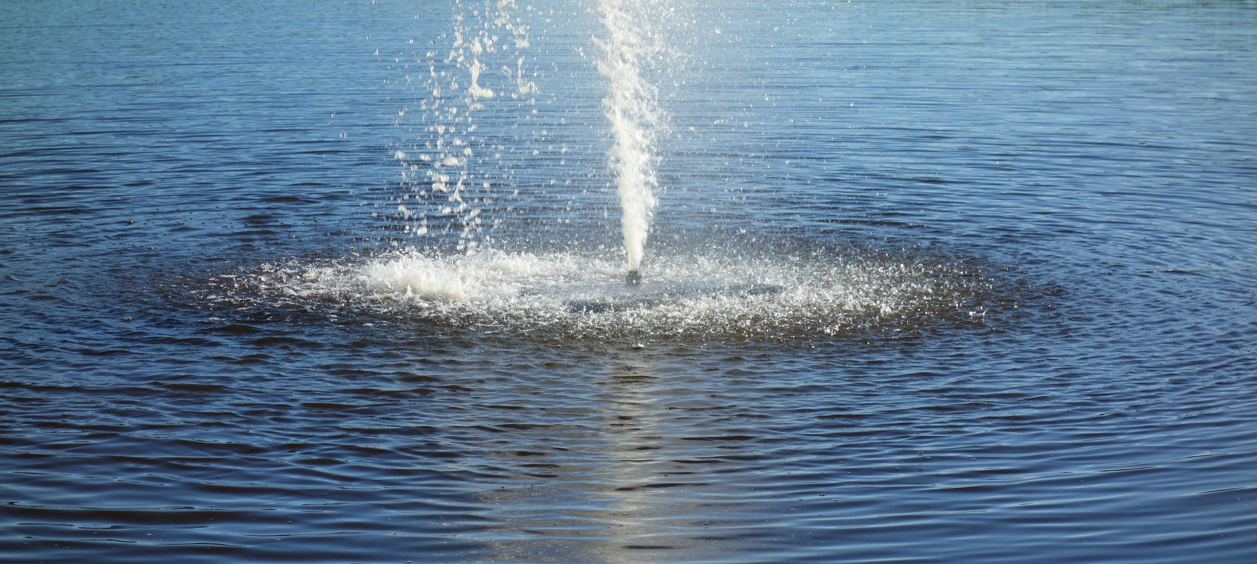 Water surface under a fountain