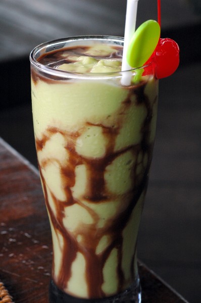 Indonesian-style avocado shake (jus alpokat) with chocolate syrup and condensed milk.