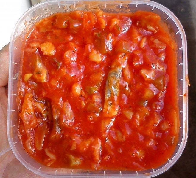 Latvian dish. The dish of herring in tomato sauce