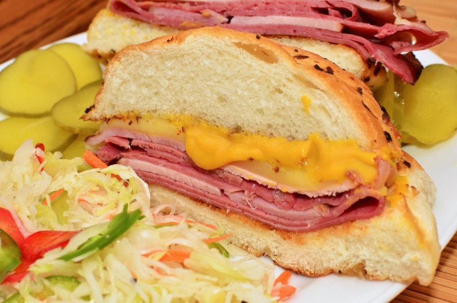 Mmm... ham, pastrami, and corned beef on an onion roll (6198207029)