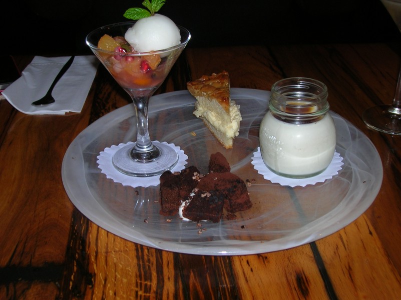 Panna cotta with Cardamom, chocolate Fudge , Lemon sorbet withn kiwi, pear, lemon, orange, grapes, persimmon, and Cheese cake