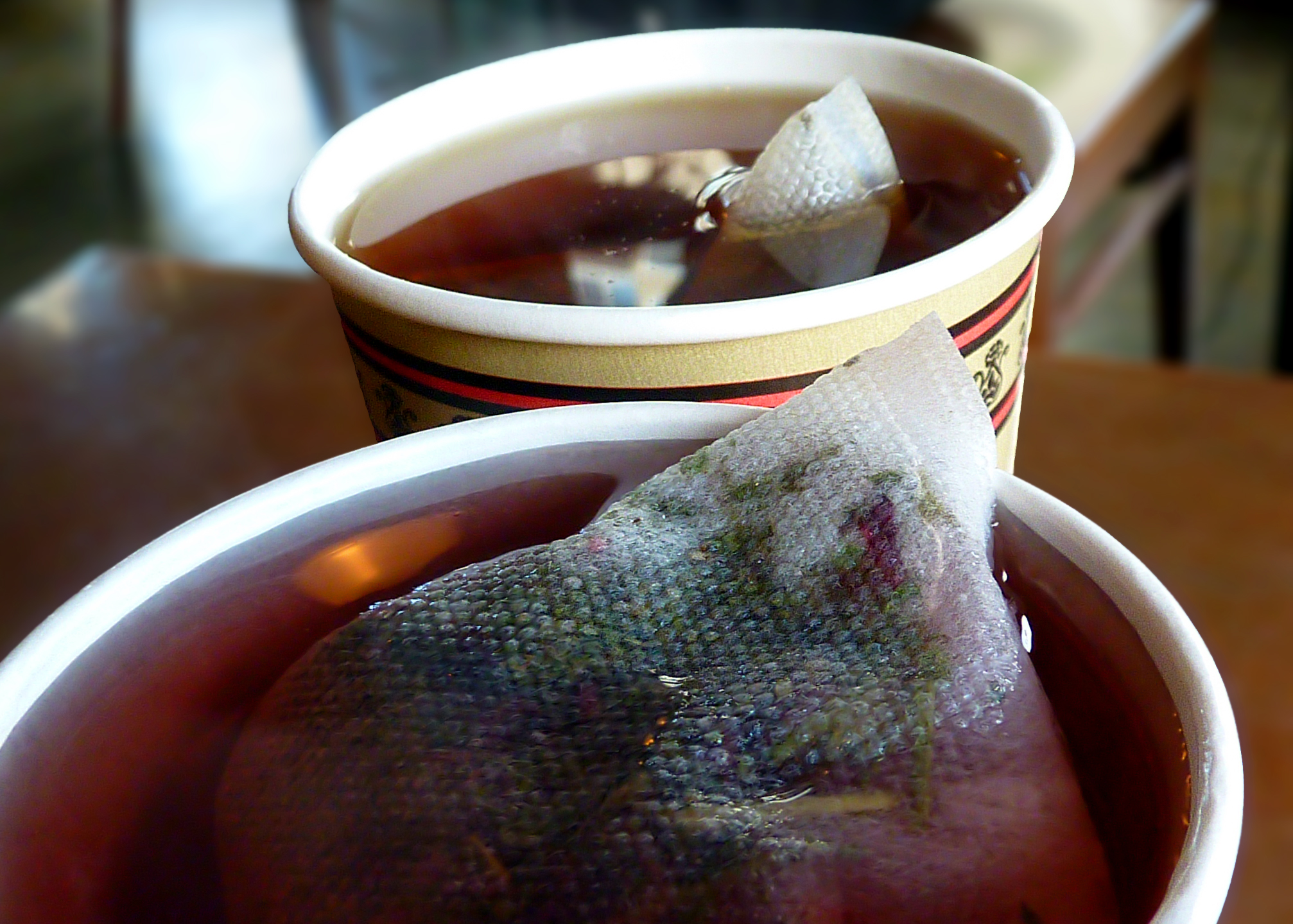 Tisane tea bag steeping close-up