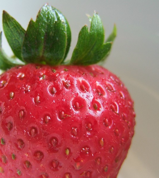Macro of strawberry with hull