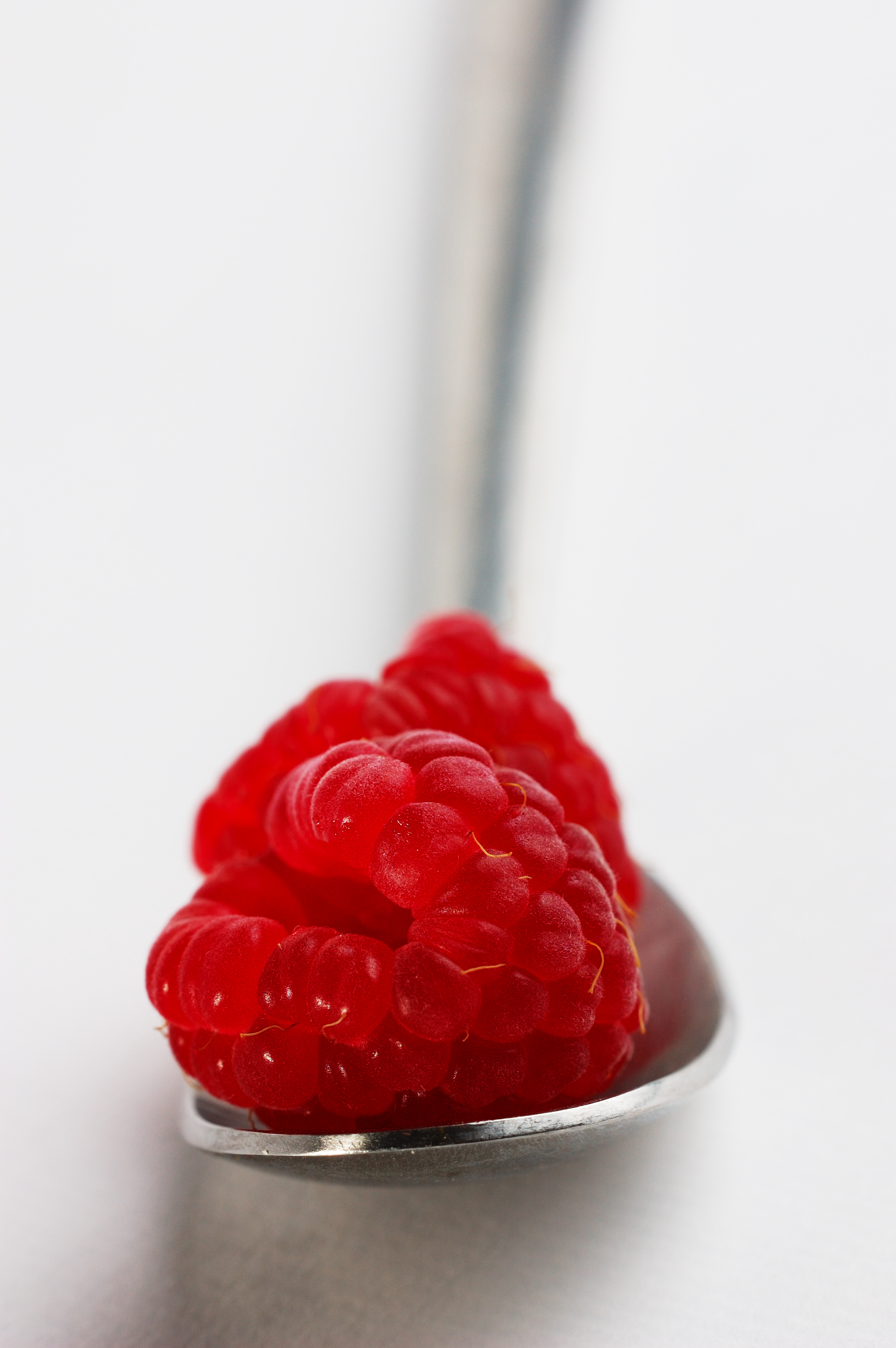 Raspberries on a spoon