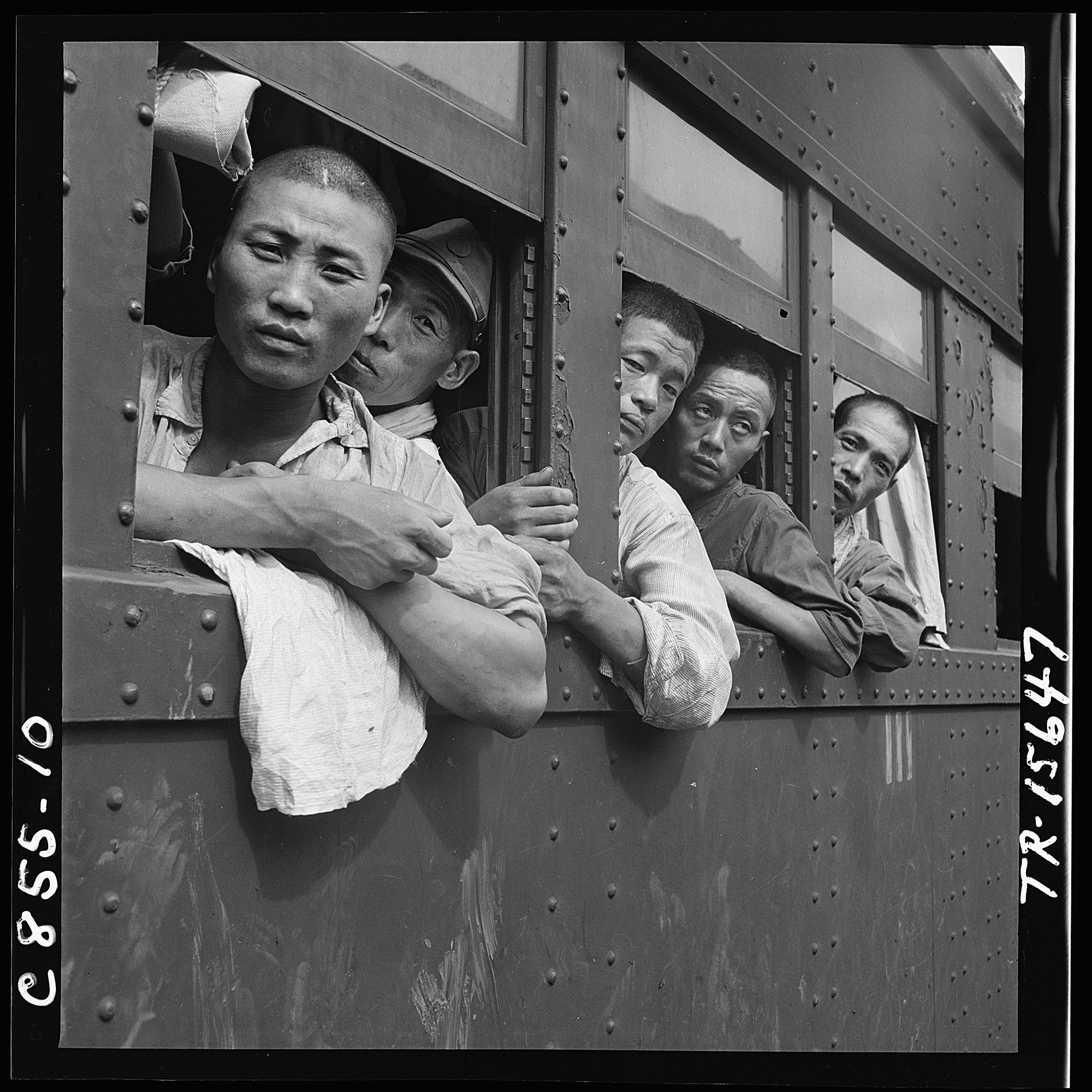 Discharged Japanese soldiers crowd trains as they take advantage of free transportation to their homes after end of... - NARA - 520938