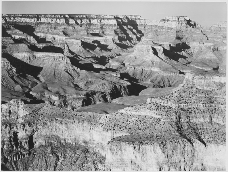 Canyon with ravine winding through center, high horizon, 