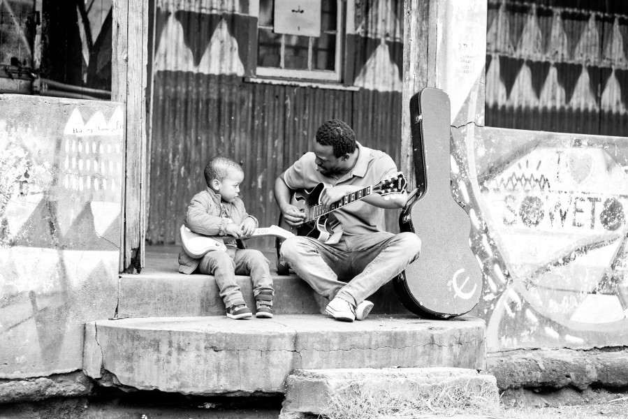 Father & Son Sharing Music Skills