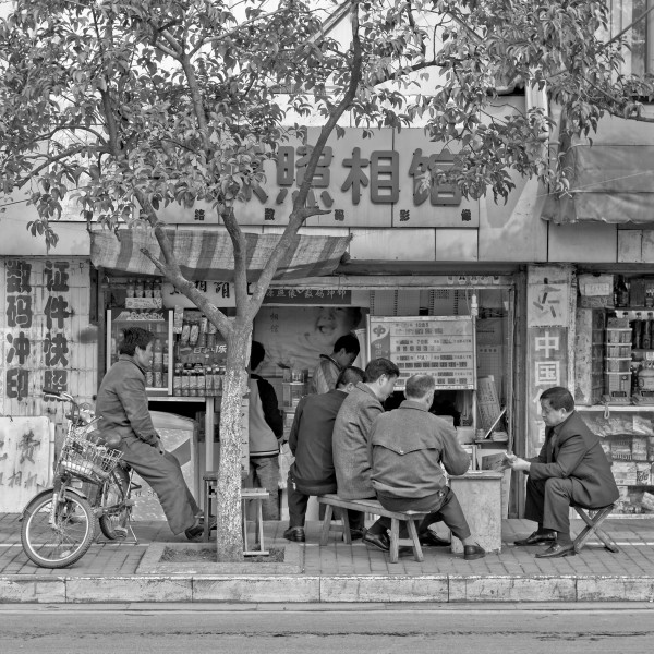 People playing card games in the street