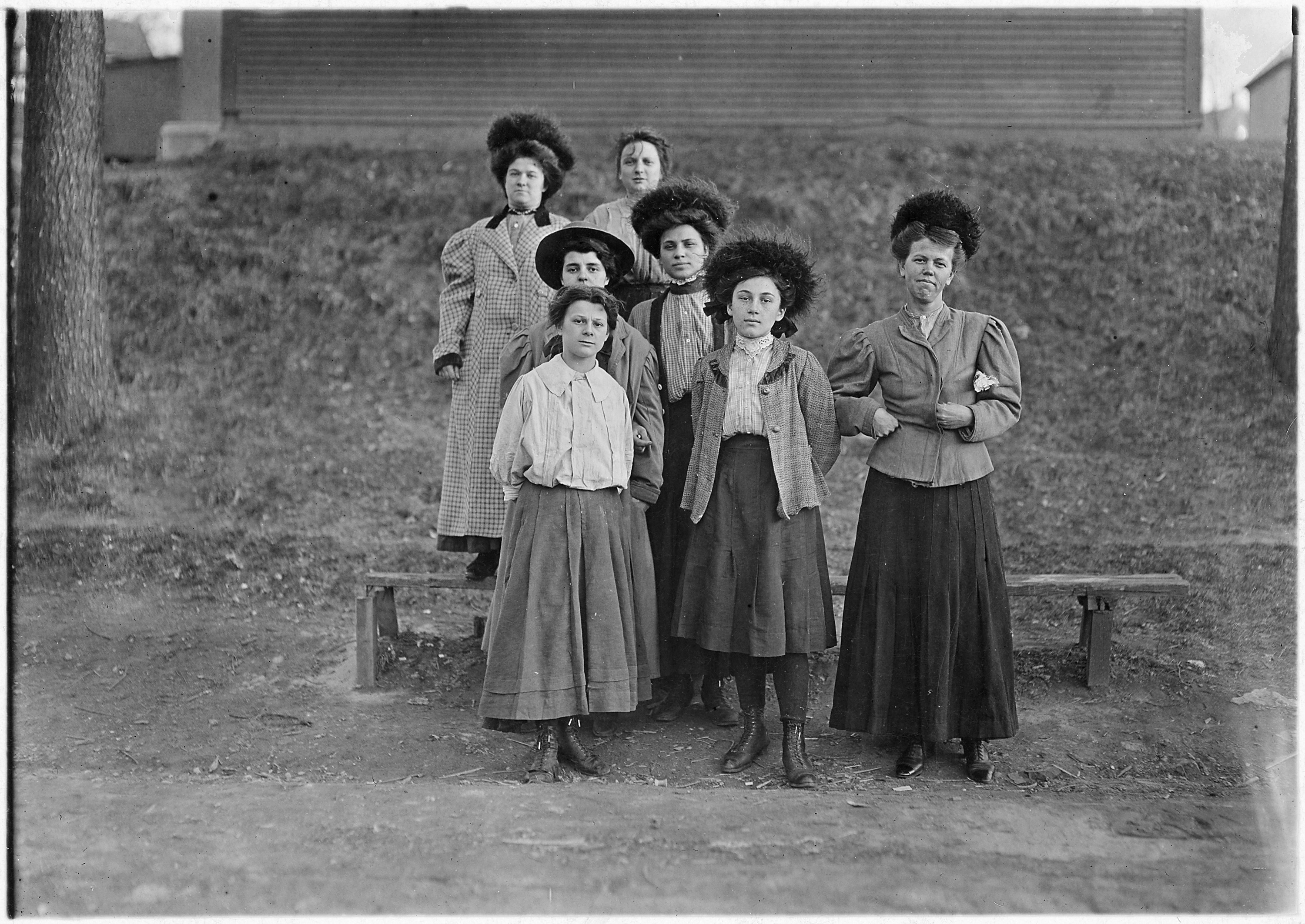 6 P.M. Only a few young girls work in the Chace Cotton Mill. In front row are Anna Grenier, 2 years in the mill... - NARA - 523187