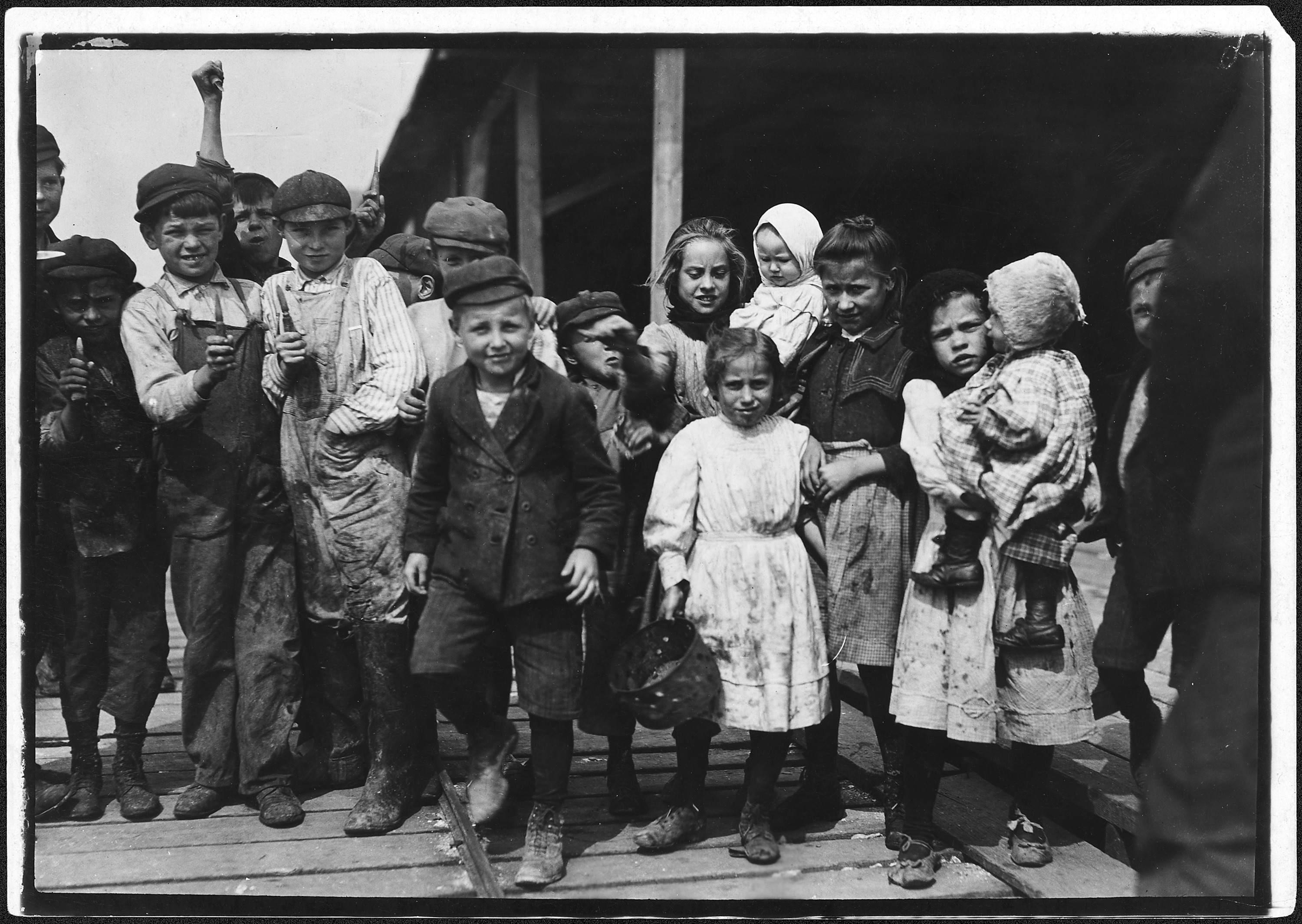 All these children except babies shuck oysters and tend babies at the Pass Packing Co. I saw them all at work there... - NARA - 523405