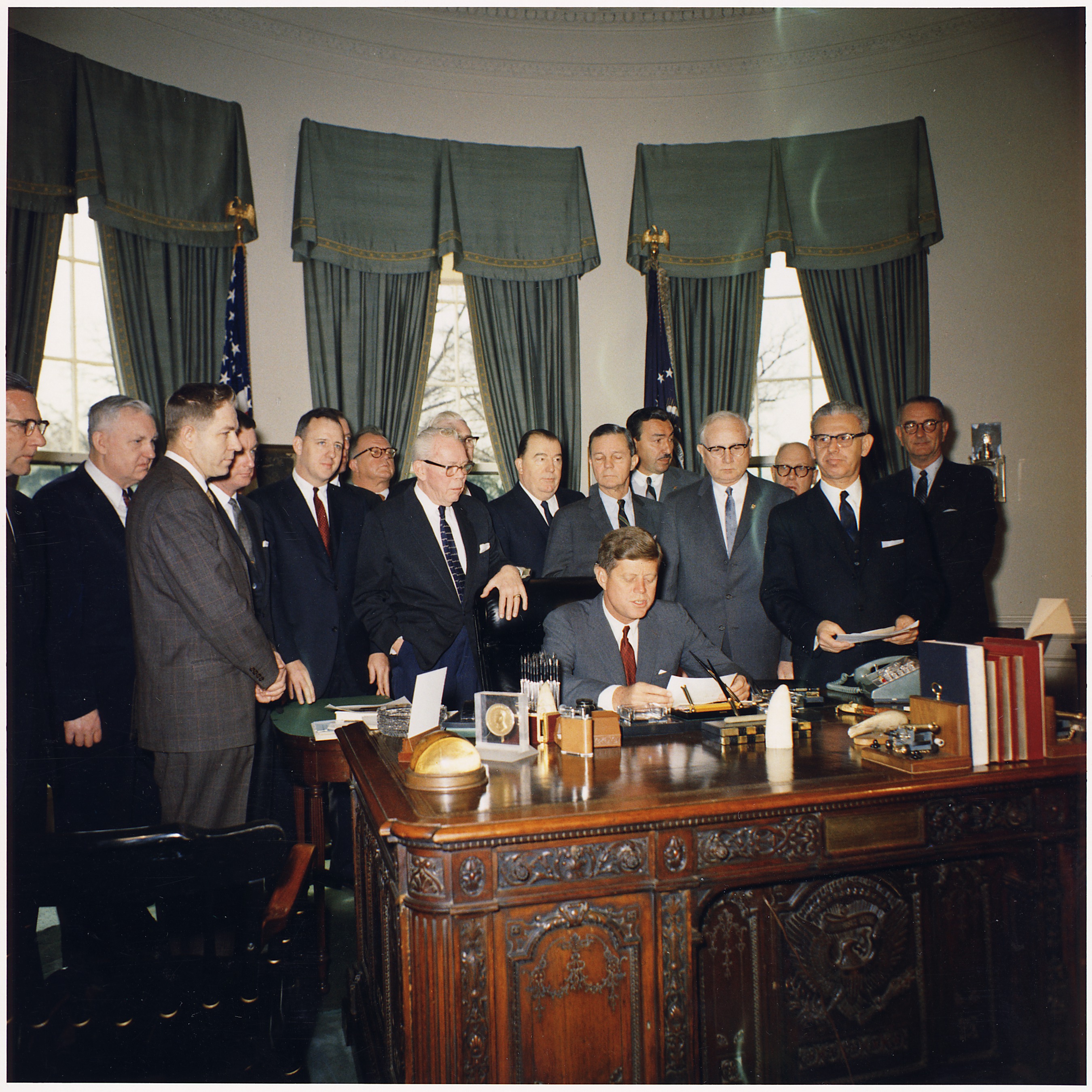 Bill Signing- Manpower Development and Training Act of 1962. President Kennedy, Secretary of Labor Arthur Goldberg... - NARA - 194205