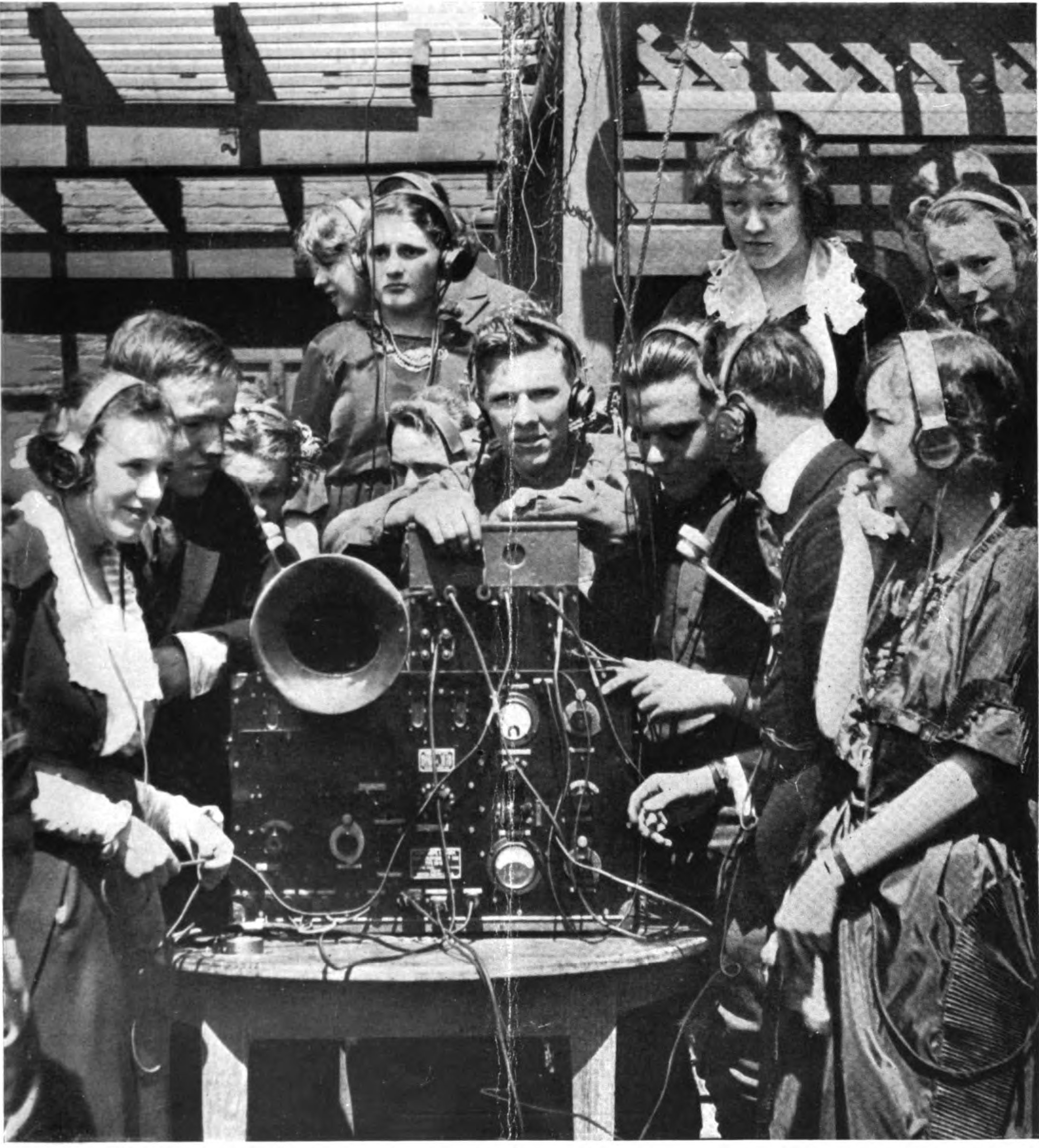 Club holds radio dance wearing earphones 1920