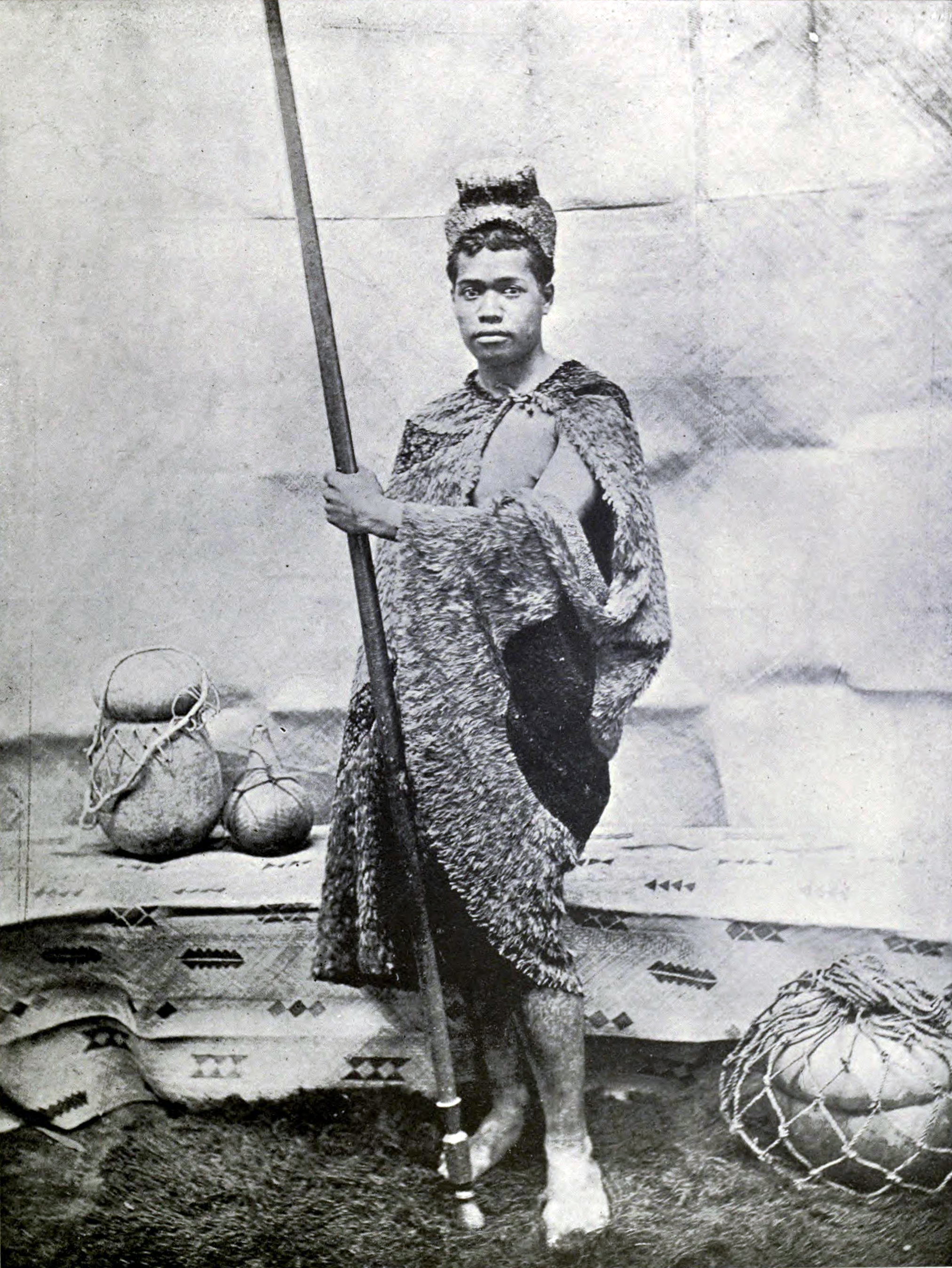 Hawaiian with cloak and helmet (1899)