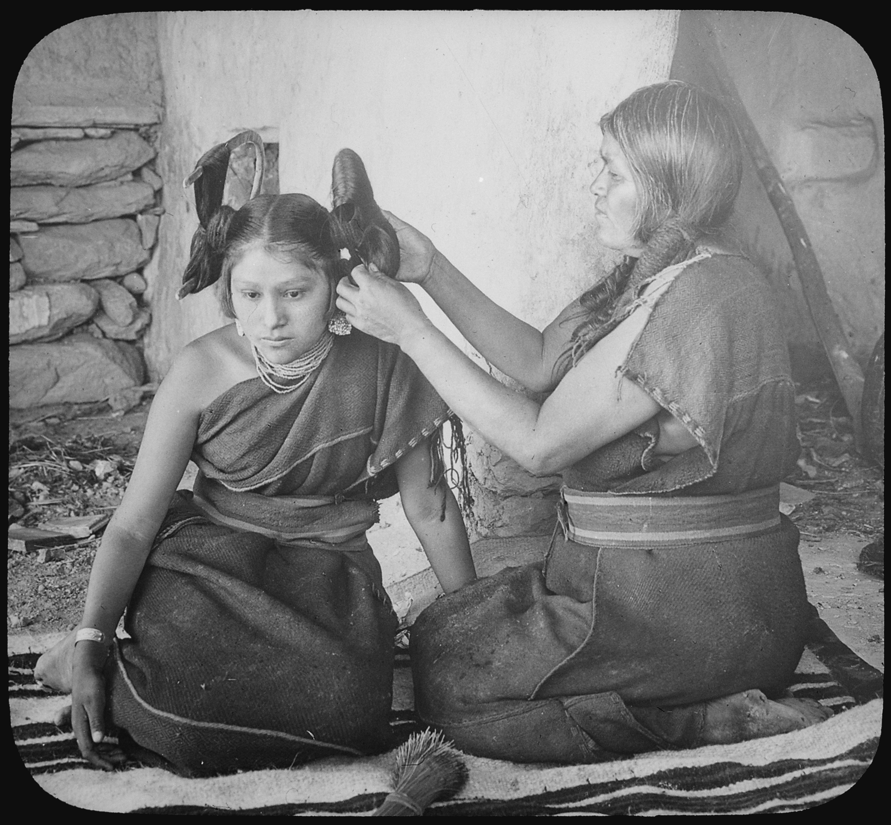Hopi woman dressing hair of unmarried girl, 1900 - NARA - 520082