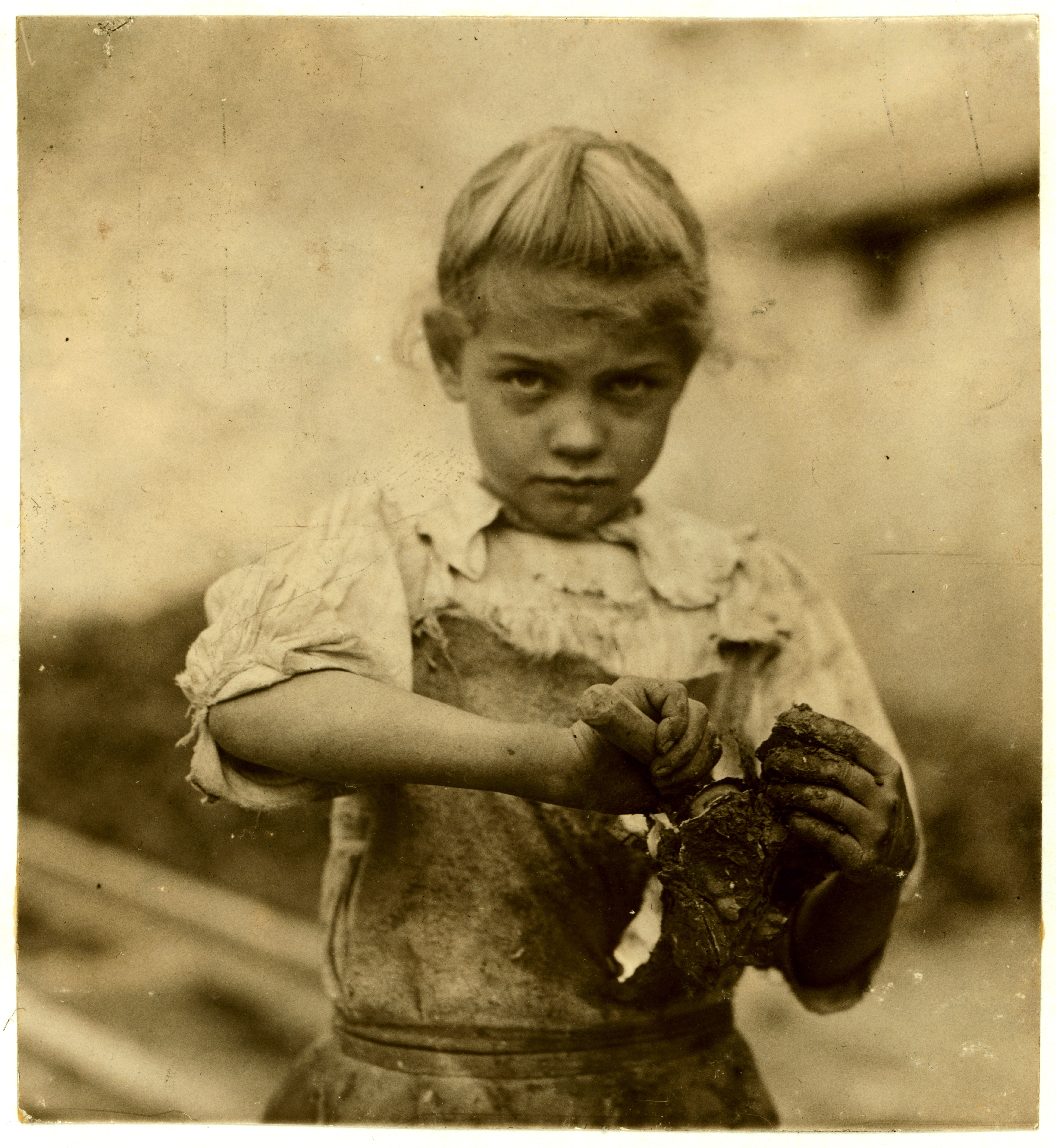Lewis Hine, 7-year old Rosie, oyster shucker, Bluffton, South Carolina, 1913
