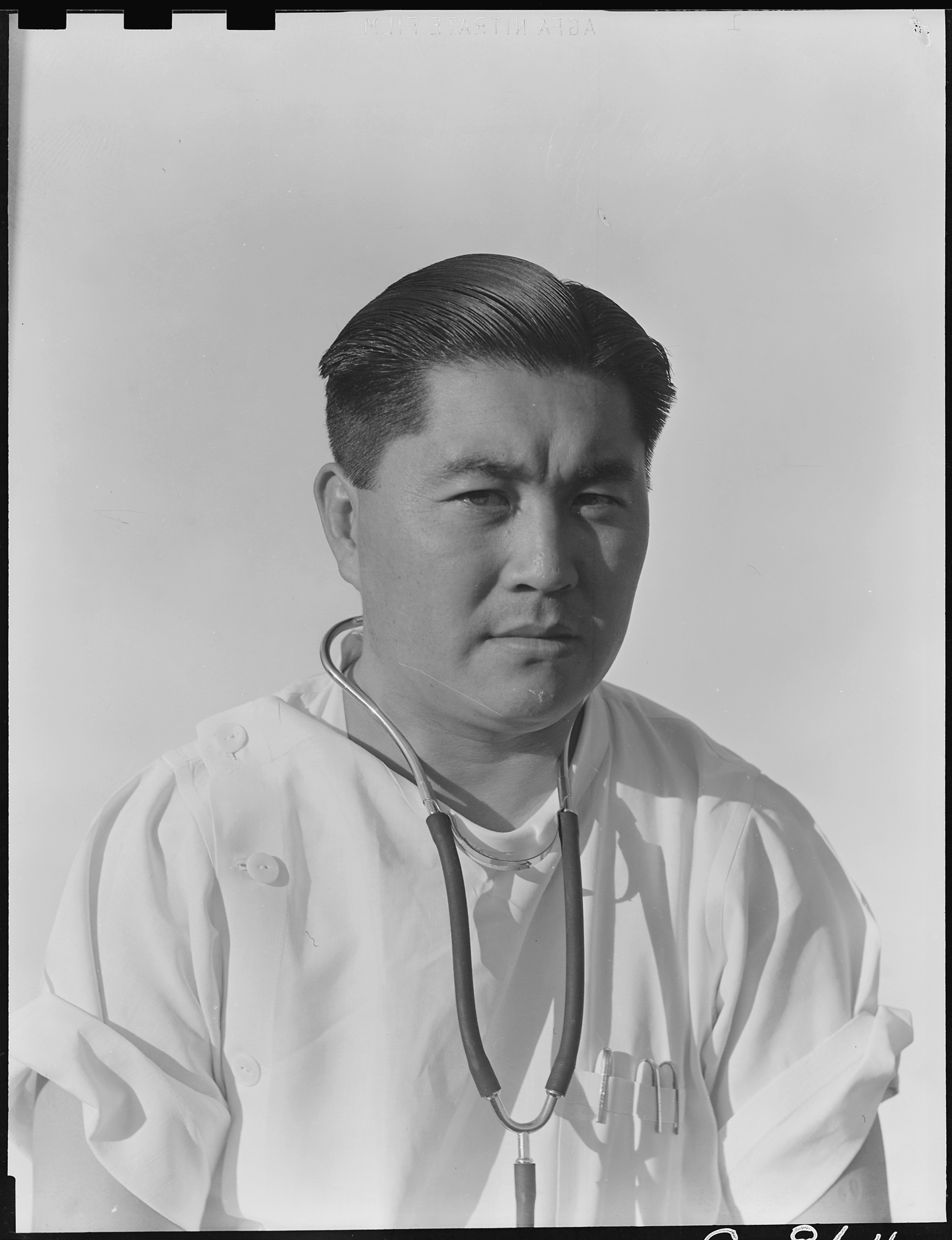 Manzanar Relocation Center, Manzanar, California. Doctor James Goto, Medical Director of Japanese a . . . - NARA - 538151