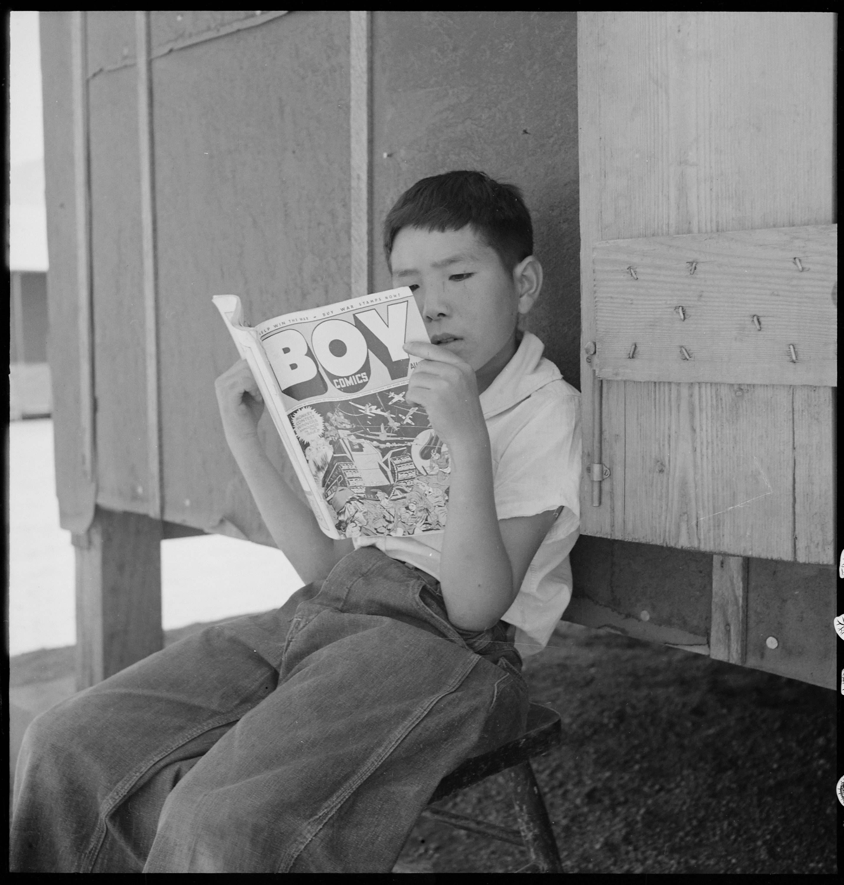 Manzanar Relocation Center, Manzanar, California. Evacuee boy at this War Relocation Authority cent . . . - NARA - 538076