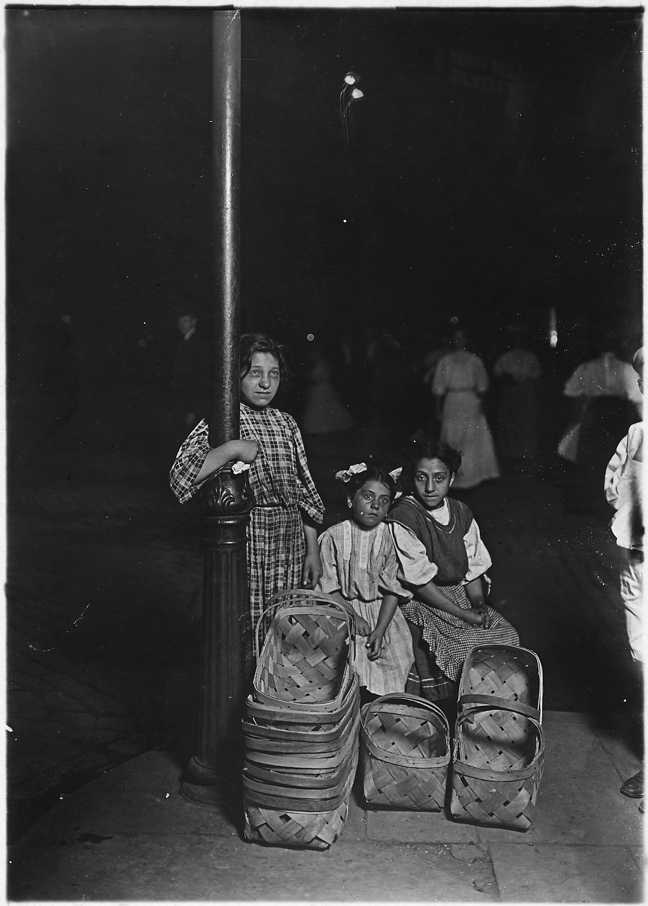 Marie Costa, basket seller, in a Cincinnati market. 10 A.M. Saturday. Cincinnati, OH. - NARA - 523070
