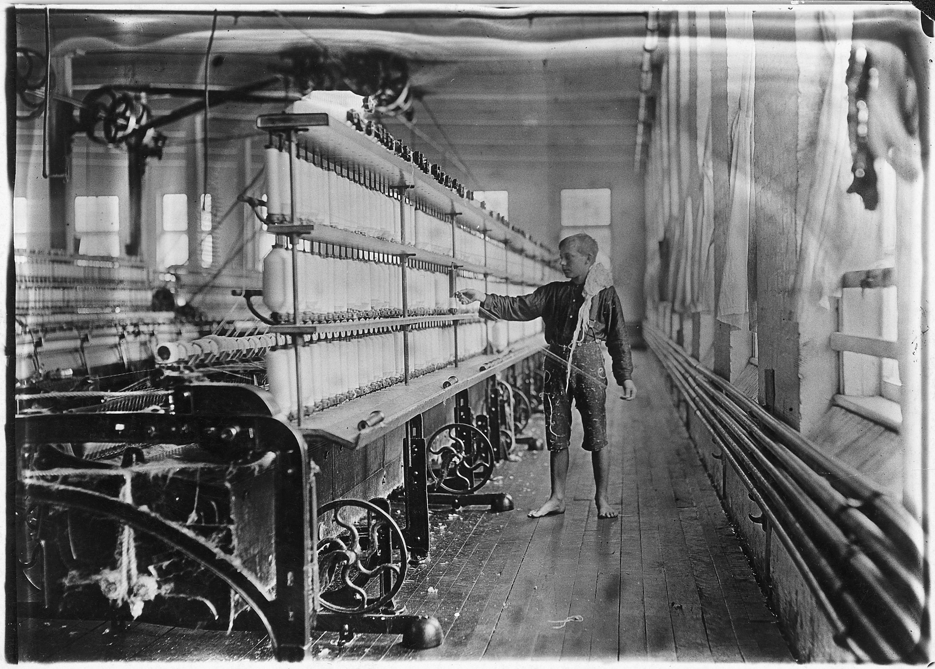 Mule-spinning room in Chace Cotton Mill. Raoul Julien a 