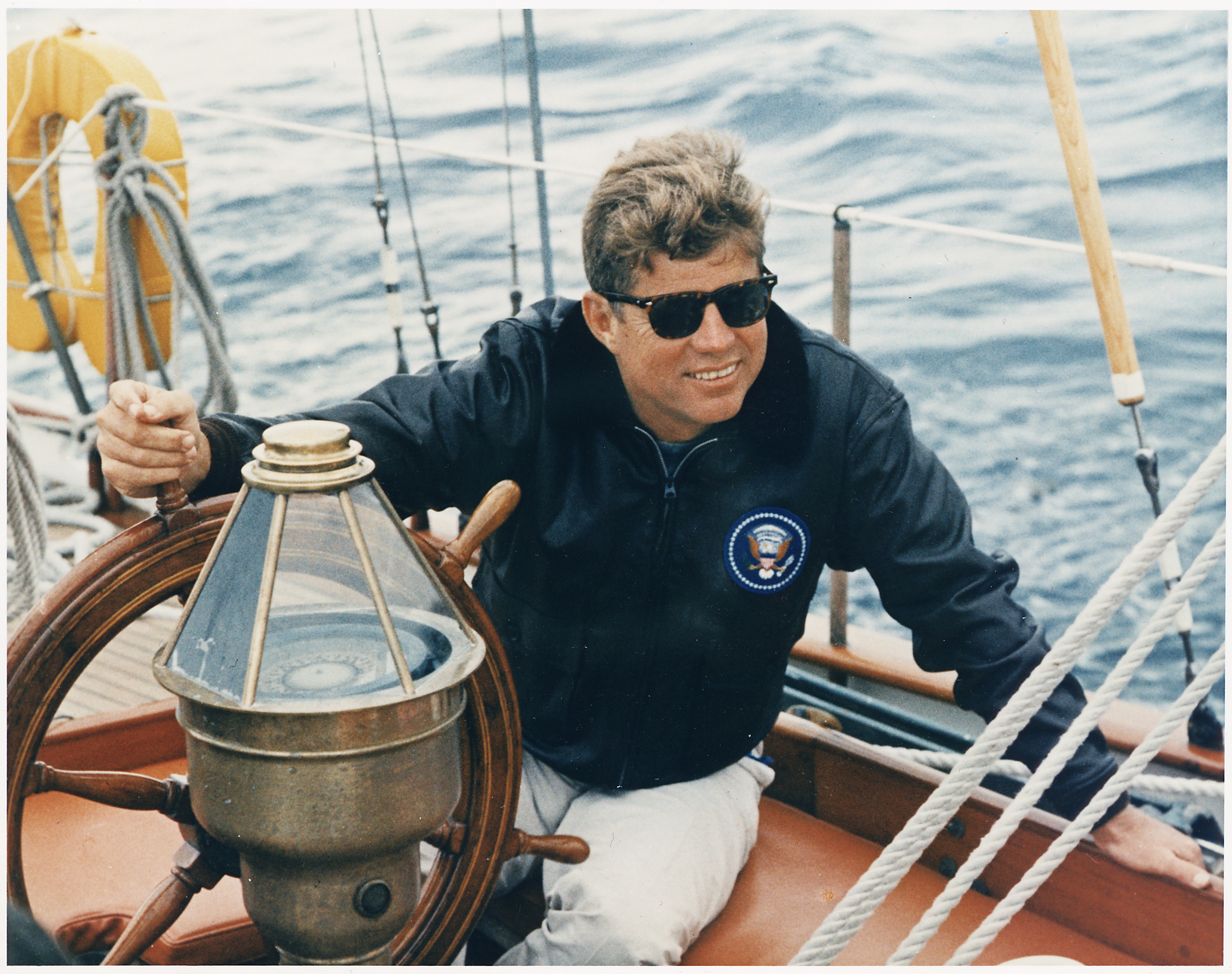 President Vacations in Maine. At the wheel of the US Coast Guard Yacht 
