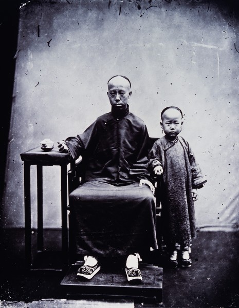 A mandarin and his son, Canton, Kwangtung province, China. Wellcome V0037104