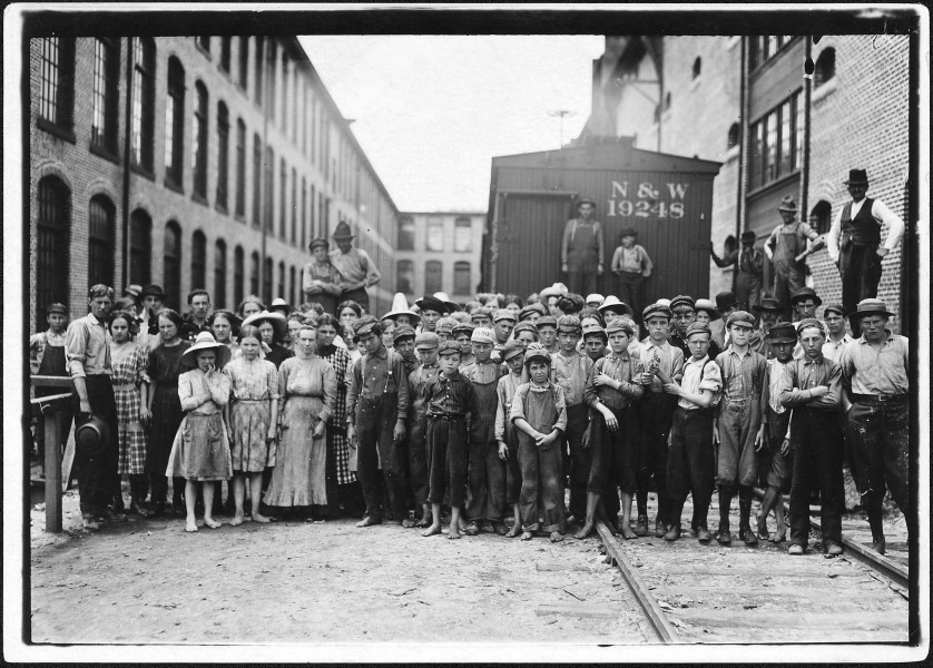 A part of the spinning force working in the Washington Cotton Mills. Group posed by overseer. All work. The overseer... - NARA - 523422