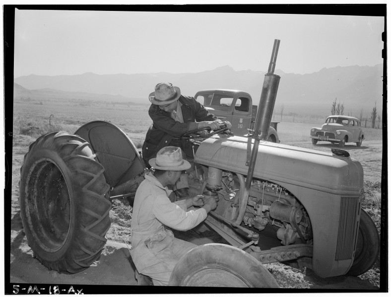 Ansel Adams Manzanar - Tractor repair- Driver Benji Iguchi, Mechanic Henr - LOC ppprs-00118