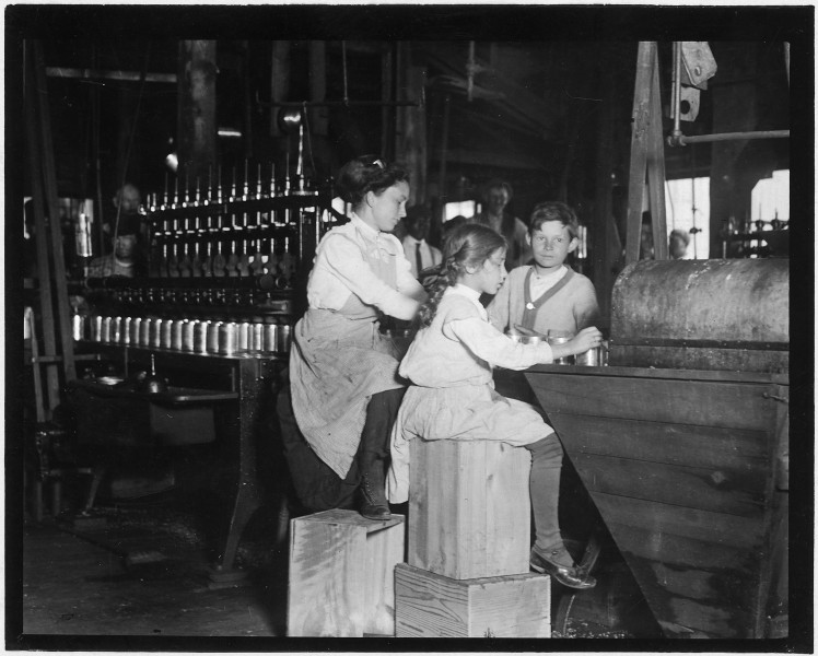 Daisy Langford, 8 years old, works on Ross's Canneries, Seaford, Del. She helps at the capping machine, but is not... - NARA - 523322