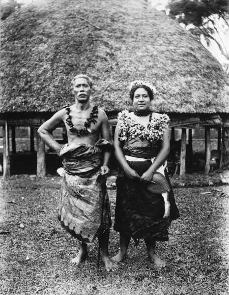 Faumuina, an important Chief of the Faleata district near Apia, and his wife, photographed, probably in the 1890s, by Alfred John Tattersall