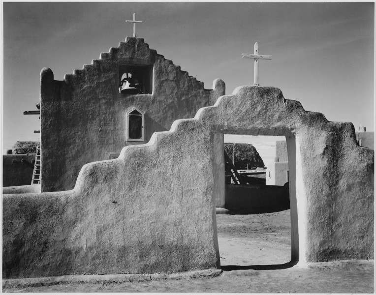 Full side view of entrance with gate to the right, 