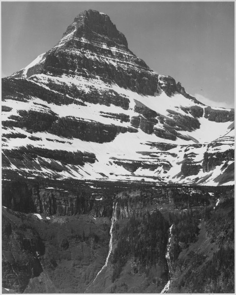Full view of snow covered mountain, including area below timberline, 