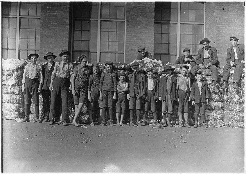 Group of boys working in Lancaster Cotton Mills. Smallest boy in middle said he has been in the mill off and on for 5... - NARA - 523118