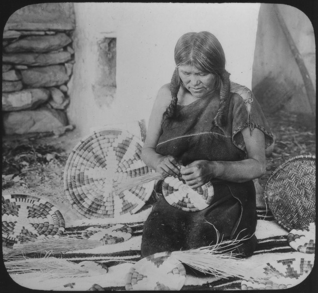 Hopi woman weaving a basket, ca. 1900 - NARA - 520083